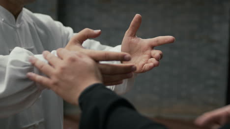 two men practicing martial arts