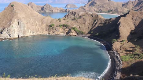 beautiful shore view with wave from top of padar island in komodo islands, flores, indonesia