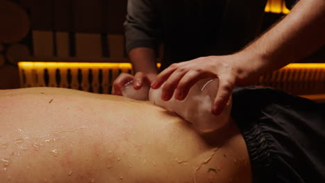 ice therapy back massage in sauna