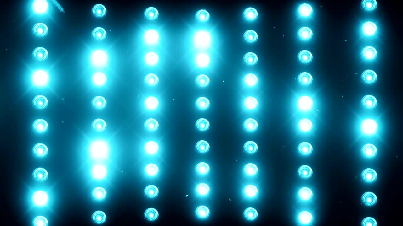 A wall of light projectors, a flash of light