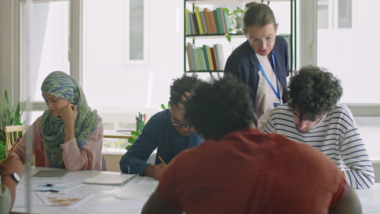 Immigrant Students Taking Test in Language School