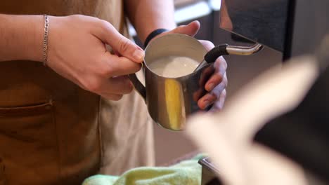 barista preparing a coffee drink