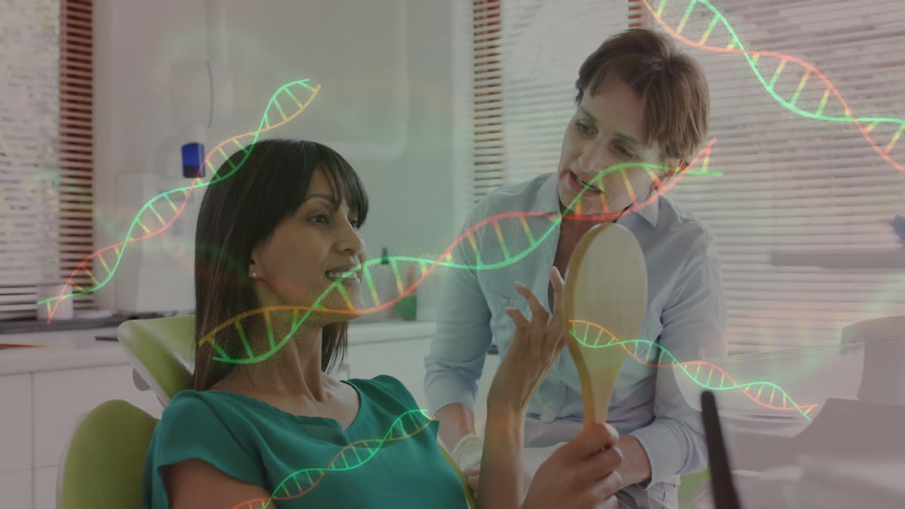 Animation of dna strands over diverse female dentist and patient