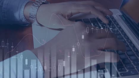 animation of financial data and graphs moving over hands of biracial man using laptop