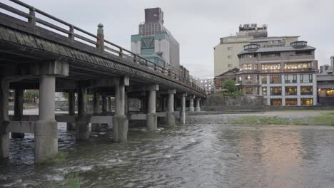 kyoto japan, sanjo bridge on cloudy day in slow motion