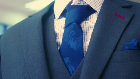 4K Cinematic fashion clothing footage of suits and ties in a tailor&#039;s shop