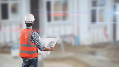 Caucasian-male-worker-wearing-an-orange-high-vest-and-a-hat,-holding-and-checking-a-plan