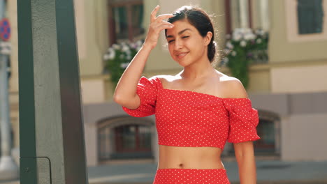 woman in red dress outdoors