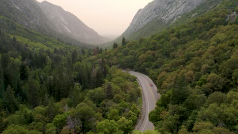 car on road trip journey in breathtaking scenic road in utah canyon