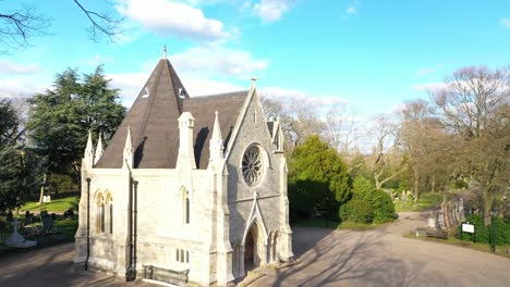 amazing reveal of a church in the middle of a cemetery, aerial