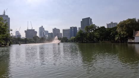 a serene city park with a central fountain