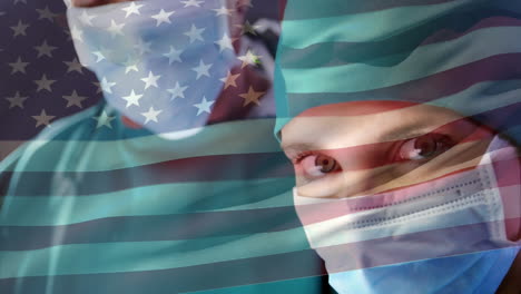 animación de la bandera de los estados unidos ondeando sobre los cirujanos con máscaras faciales