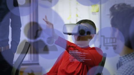 Multiple-blue-digital-icons-floating-against-caucasian-businesswoman-wearing-vr-headset-at-office