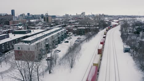 4k winter city train pan up drone sequence_002