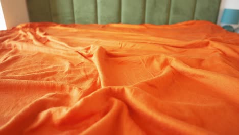 orange bed sheets