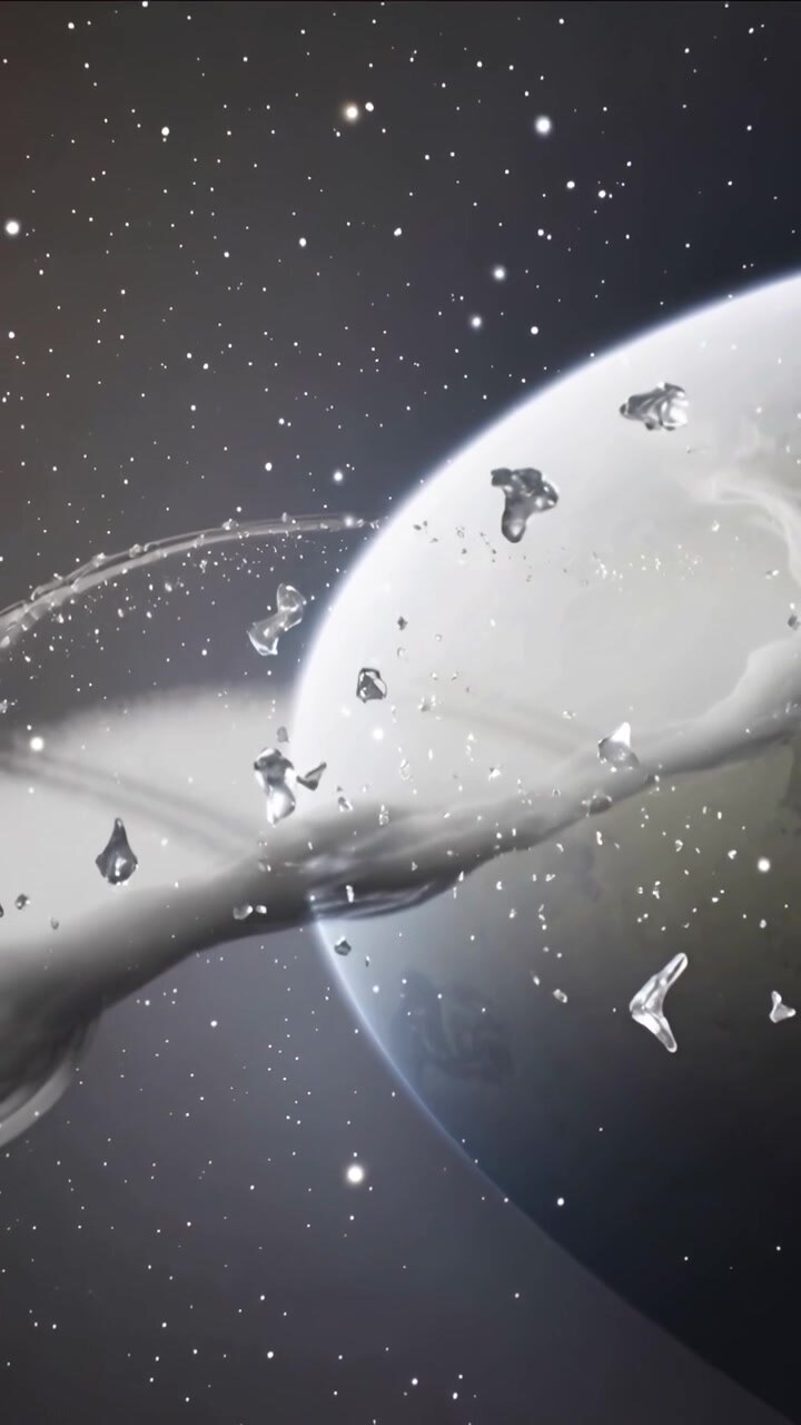 Vertical video: Gravity pulling ice shards upward near gas giant limb, ribbon shifting across stars