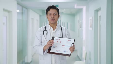 indian doctor explaining medical reports