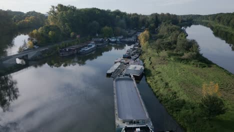 aerial view revealing anchored towboats in a bay on the elbe river