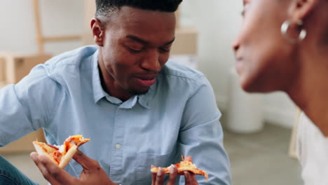 New-house,-boxes-and-couple-with-pizza-eating