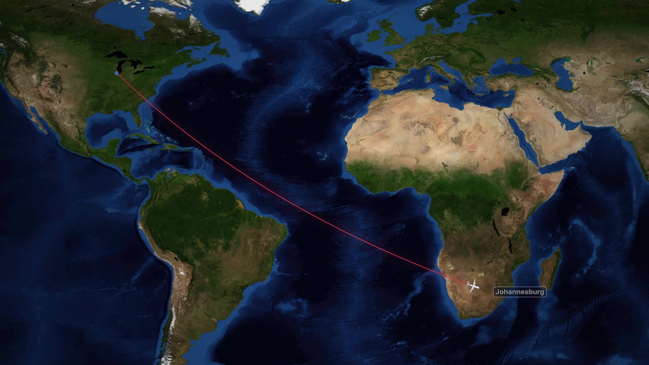 A digital world map tracks a plane flying from Chicago to Johannesburg with red lines