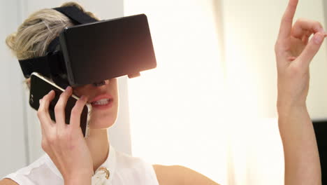 Woman-using-virtual-reality-headset-in-optical-clinic