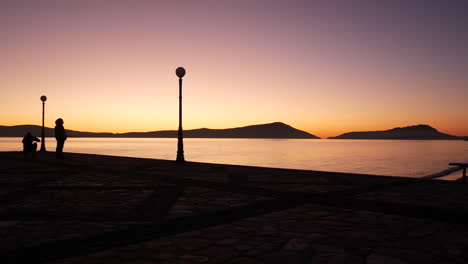 Epic-shot-of-a-purple-sunset-view-from-a-pier