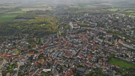 kutna hora czechia aerial v4 high altitude birds eye view drone flyover hlouska capturing picturesque townscape of hillside town center from above - shot with mavic 3 cine - november 2022