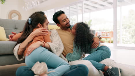 Happy-family,-parents-and-children-hug-at-home