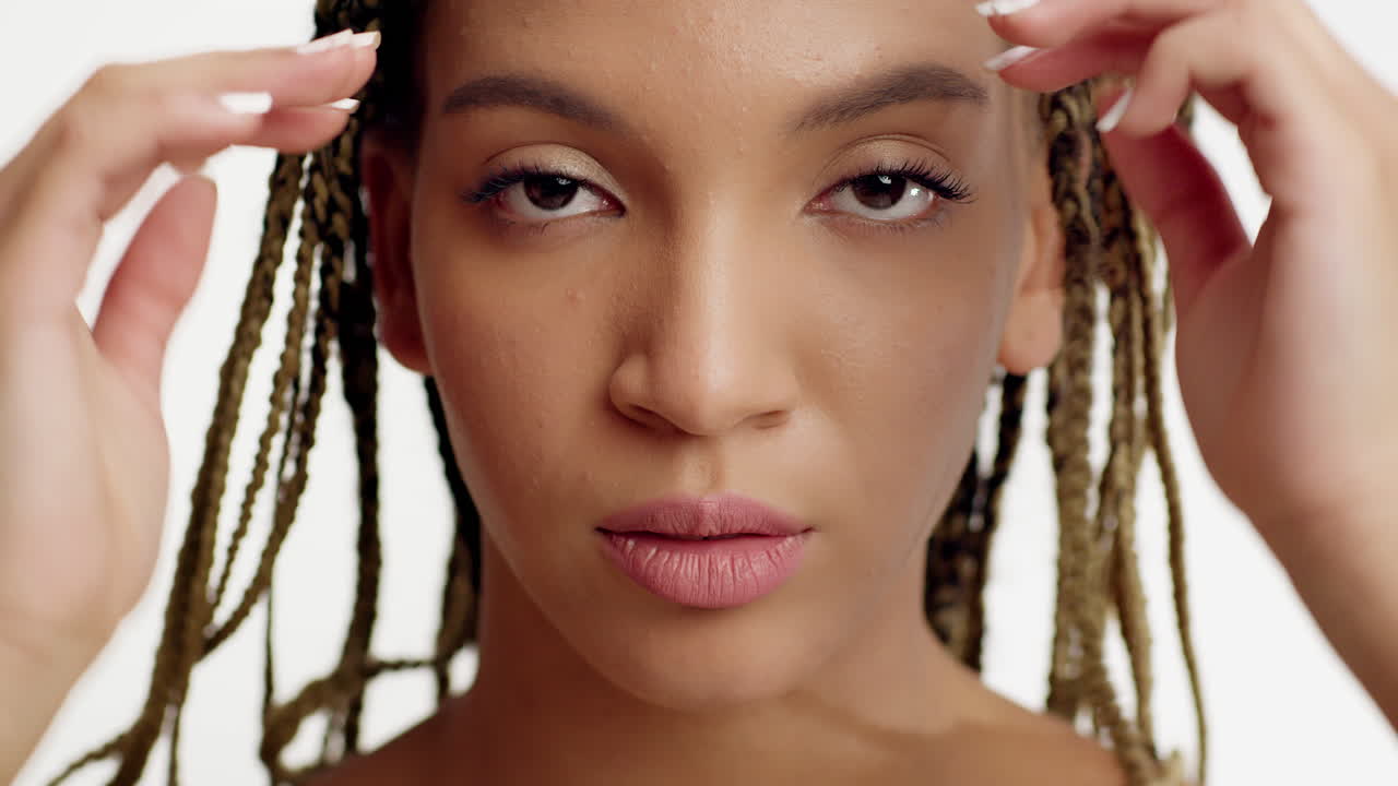 Close-up Portrait of a Woman with Braids