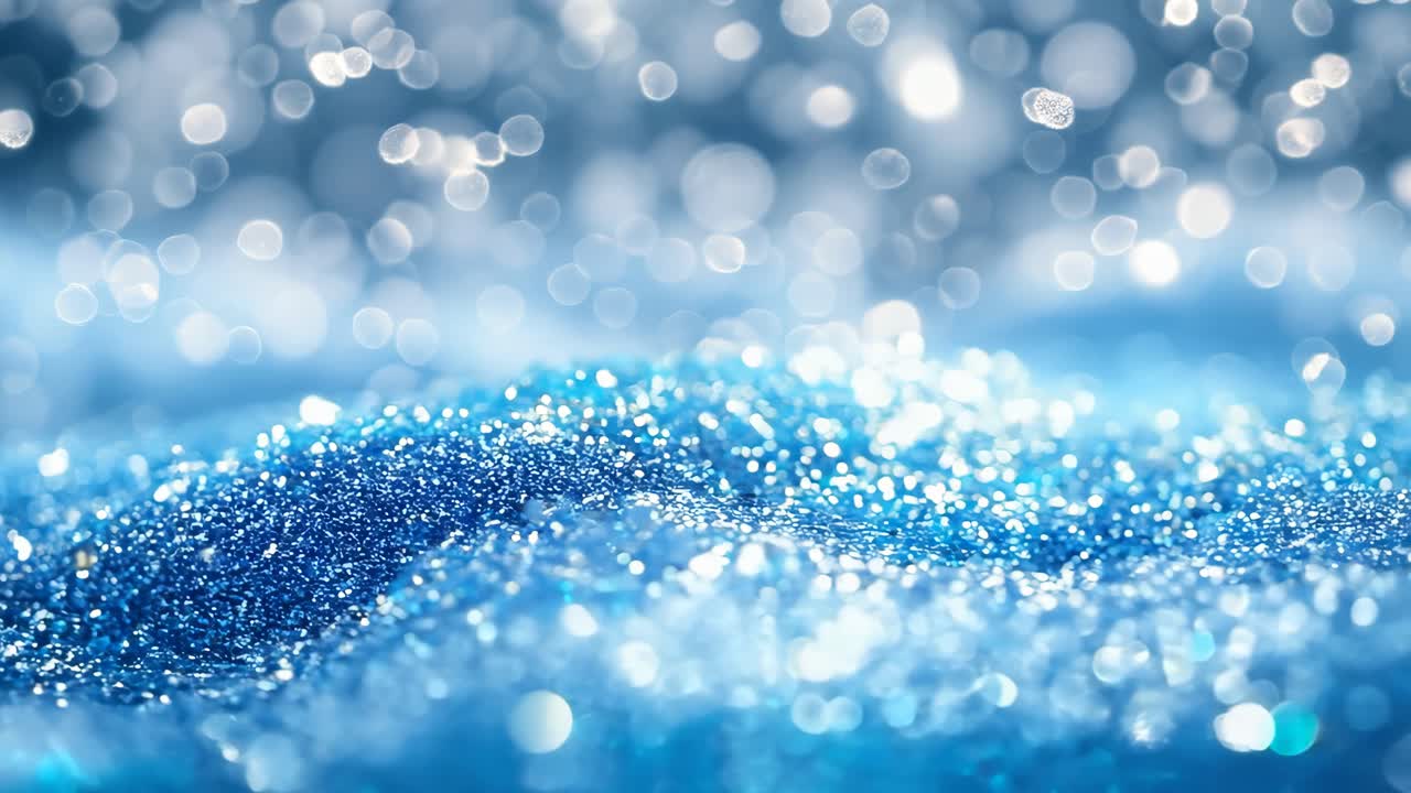 A snowy hill with a blue sky in the background. The snow is white and the hill is blue. The snowflakes are falling gently, creating a serene and peaceful atmosphere