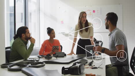 in office, diverse team discussing technology project with digital animation overlay