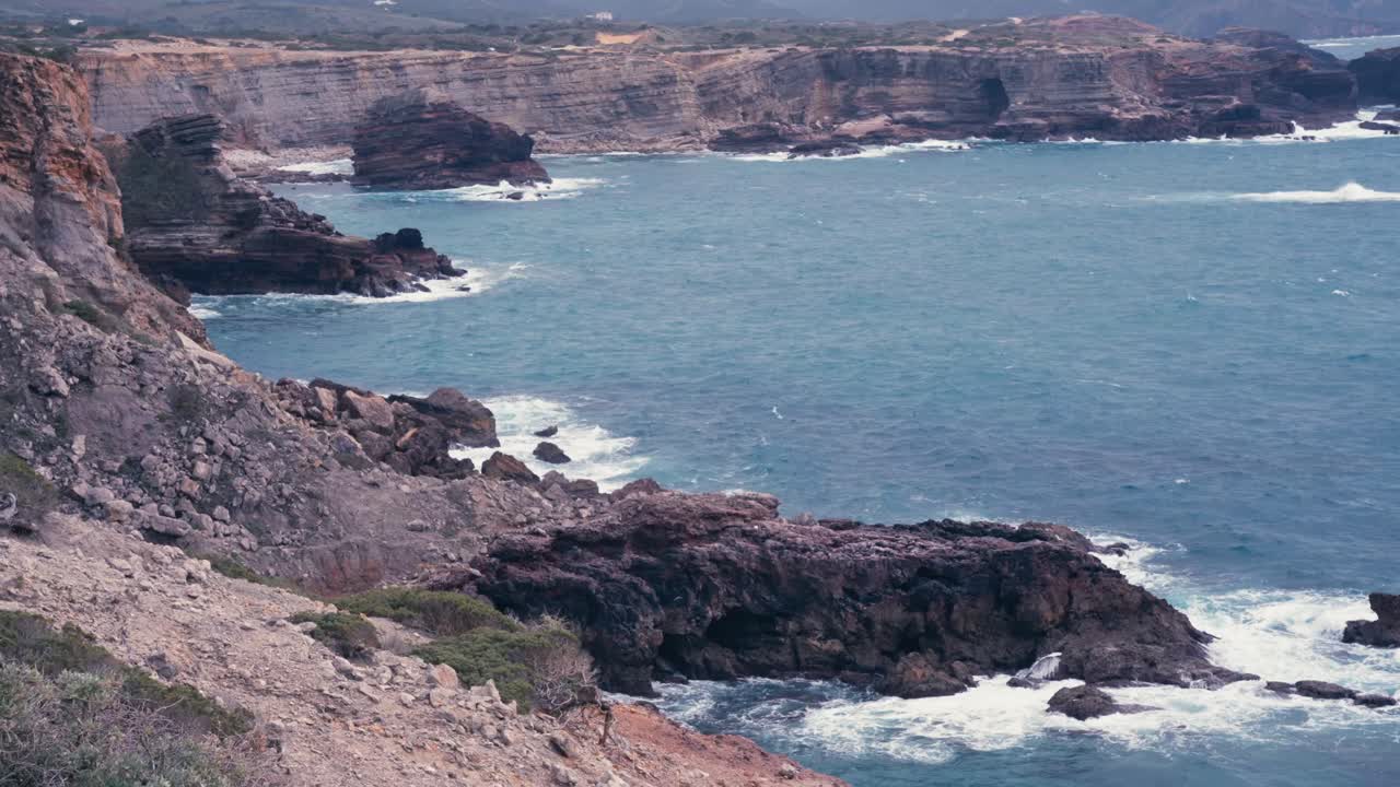 Sea Cliffs Of Praia do Amado On The Algarve Coast In Portugal. Static Shot