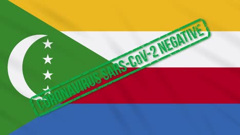 comoros swaying flag with green stamp of freedom from coronavirus, loop