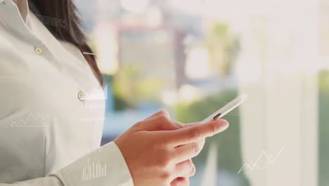 Animation-of-financial-data-processing-over-asian-businesswoman-using-smartphone-in-office