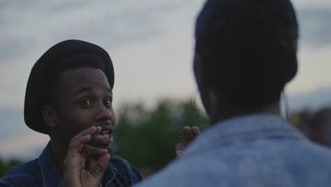 African-American-couple-having-an-argument-outside-in-the-evening