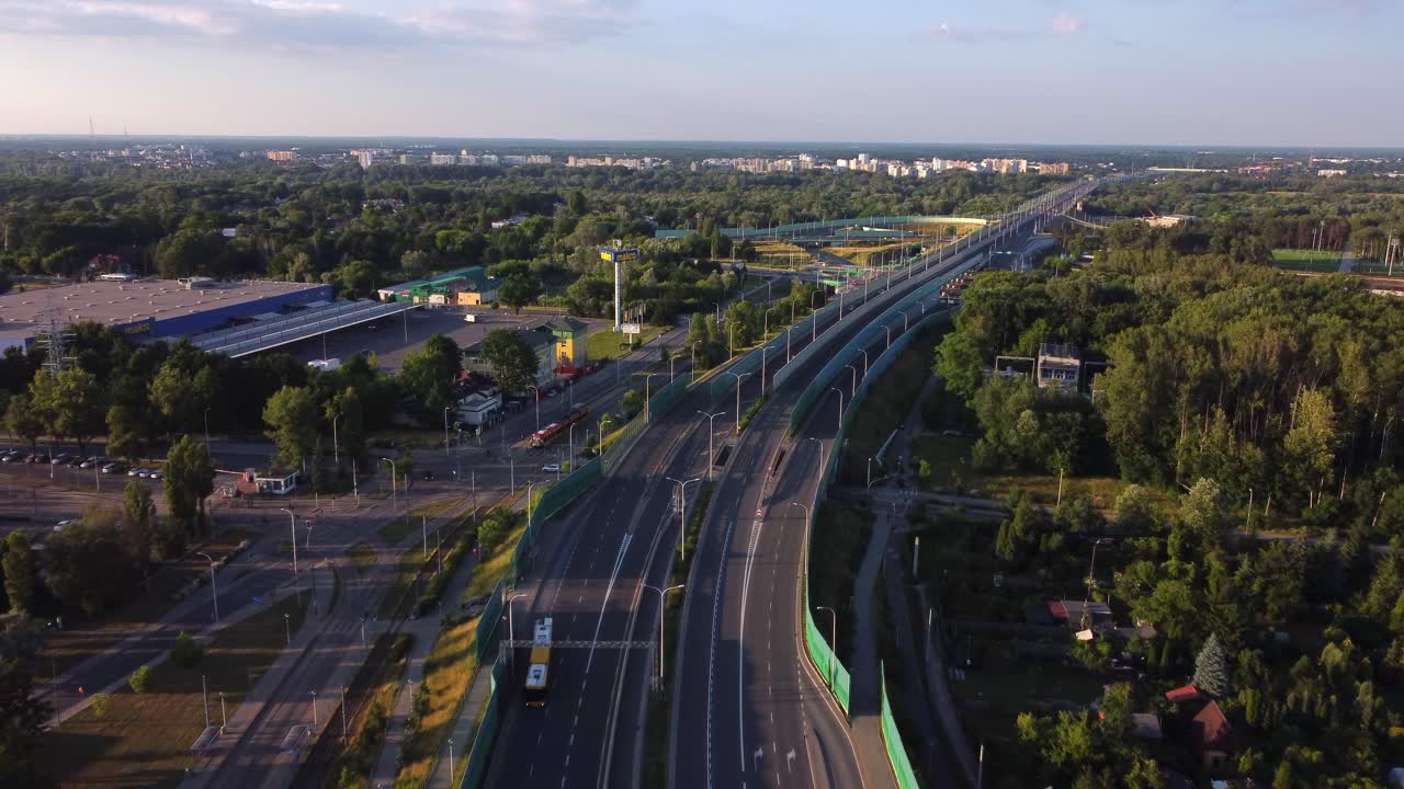 busy 4 lanes road and bridge seeing from the sky, cars are passing by