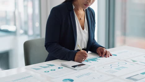 businesswoman analyzing financial data