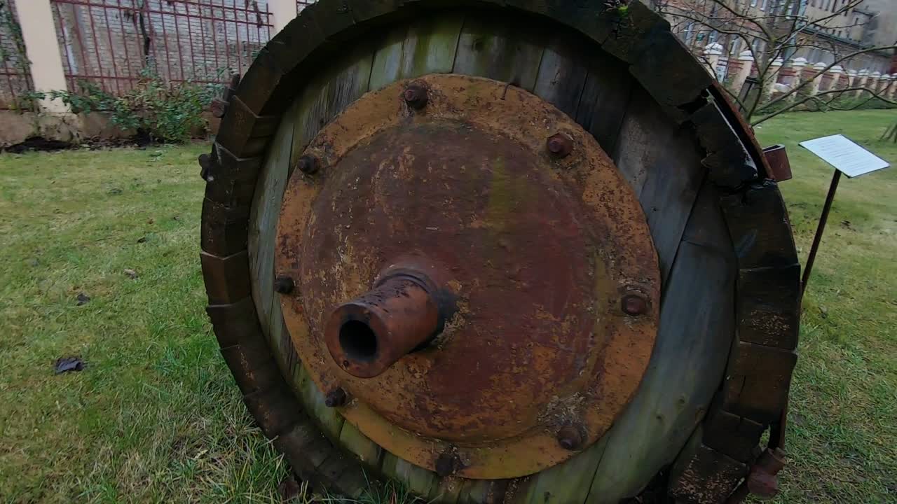 Drum Shape Old Capacity Made Of Metal And Wood. Slow Motion Arc Left Shot