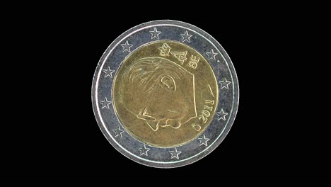 belgium 2011 2 euro obverse with king albert ii portrait rotating on black background