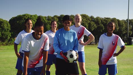 female soccer team standing on soccer field. 4k