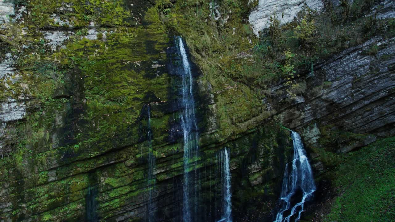 aerial shot of gorges du flumen waterfall in Jura, bourgogne franche comte region, french countryside during autumn