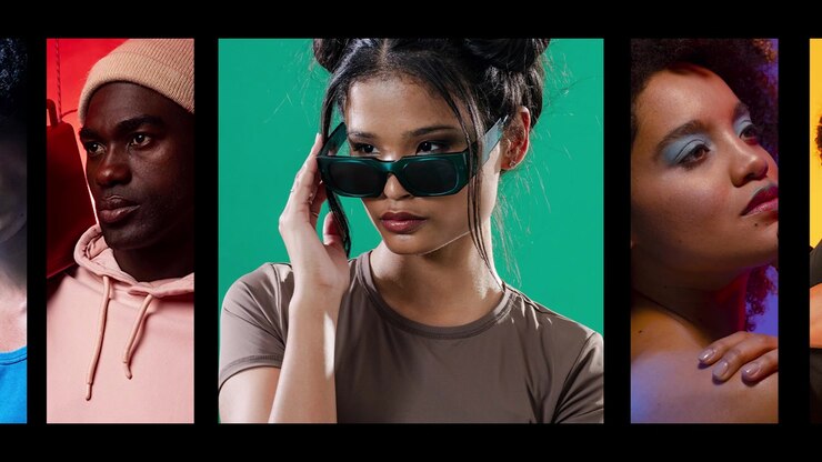 Gruppo eterogeneo di modelli alla moda in posa in studio