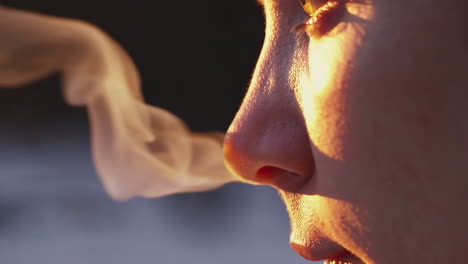 person's breath visible in cold air