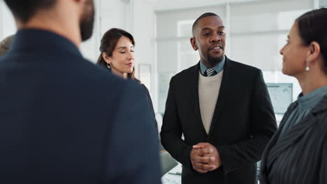business team celebrating a successful deal with a handshake