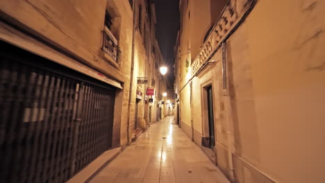 narrow street in the old town montpellier during pandemic night