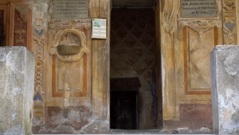 Entrance-of-Holy-Sepulchre-at-Mountain-of-Varallo,-a-christian-devotional-complex,-a-unesco-world-heritage-site-close-to-river-Sesia-near-the-town-of-Varallo-Sesia-in-Italy