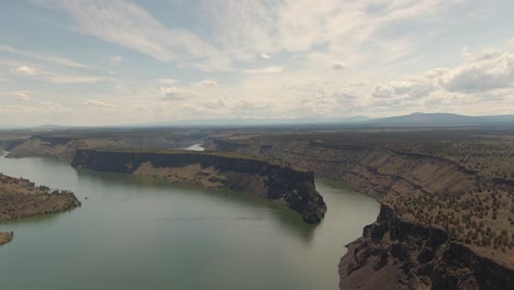 Beautiful-Aerial-View-of-The-Cove-Palisades-State-Park-during-a-cloudy-and-sunny-summer-day