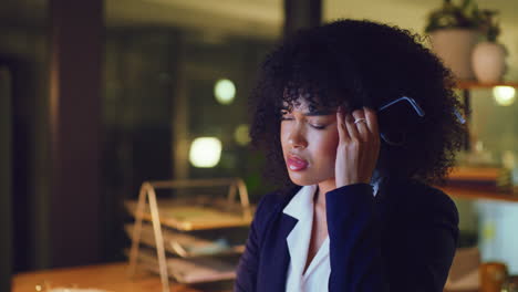 stressed business woman working late on a computer