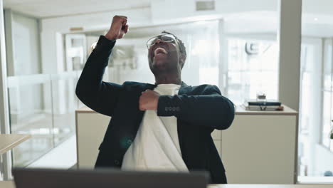 Excited-black-man,-laptop-and-success-in-office