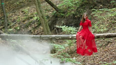 woman in forest in cloud of smoke